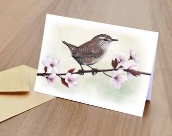 May include: A brown and white wren perched on a branch with pink blossoms. The bird is facing right and has its wings folded. The background is a soft green.