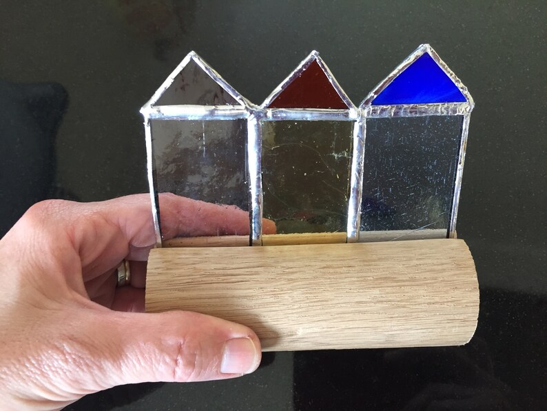 Stained glass beach huts in oak block