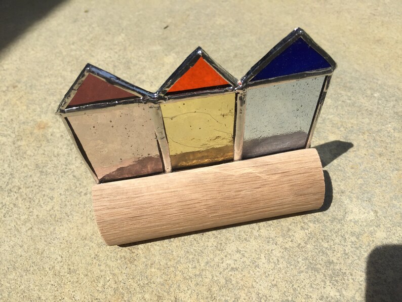 Stained glass beach huts in oak block