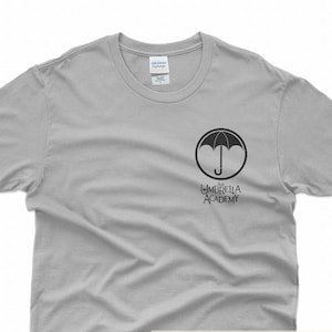 The Umbrella Academy shirt Umbrella Academy Pocket T-shirt The Umbrella Academy patch Crest Pin Five Hargreeves Poster T-shirt Unisex Tee P3