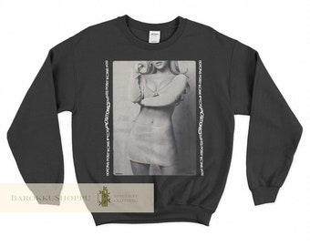 May include: Black sweatshirt with a graphic print of a woman in a black and white photo. The text "POSITIONS" is repeated on the left and right sides of the image.