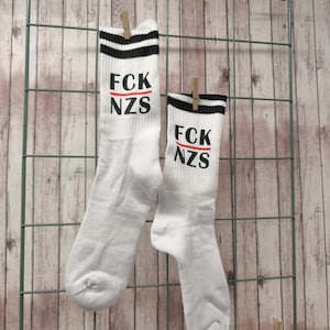 Statement socks with organic cotton FCK NZS