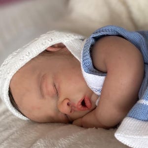 45cm full body silicone baby doll with drinking system, wet diaper, rooted hair
