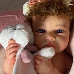 Full silicone doll 20 inch grafted hair and armor on arms and legs