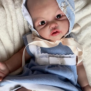 Full body silicone doll 45 cm girl with poseable arms and legs