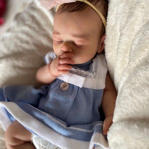 45cm full body silicone baby doll with drinking system, wet diaper, rooted hair