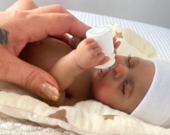 33 cm grote reborn baby van Afro-Amerikaans platina siliconen, volledig lichaam