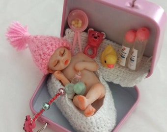 Polymer clay newborn with his travel basket, miniature baby with grooming accessories, small ooak doll, PINK hat baby