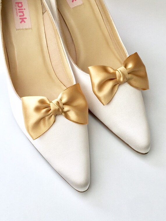 gold bow shoes