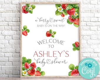 Könnte beinhalten: Ein weißes bedruckbares Schild mit Erdbeer-Motiv. Das Schild lautet "a berry sweet baby is on the way!" und "Welcome to Ashley's baby shower".