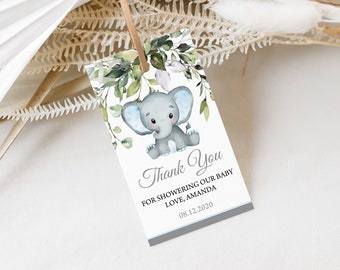 May include: A light blue thank you tag with a gray elephant illustration and green leaves. The text reads "Thank You for showering our baby love, Amanda 08.12.2020".