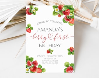 May include: A white invitation with red and green watercolor strawberries. The text reads "Join us to celebrate Amanda's berry first birthday. Saturday August 10 2:00pm 611 Nestate Dr Blytheville, AR 72315 RSVP to 123-456-7890"