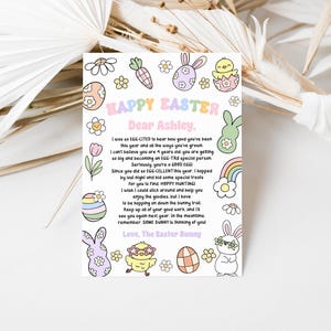May include: A colourful card featuring a bunny rabbit and an Easter egg design. The card reads "Happy Easter" and "Dear Ashley". The text on the card says "I was so EGG-CITED to hear how good you've been this year and all the ways you've grown. I can't believe you are 4 years old. You are getting so big and becoming an EGG-TRA special person. Seriously, you're a GOOD EGG! Since you did so EGG-CELLENT this year, I hopped by last night and hid some special treats for you to find. HOPPY HUNTING! I wish I could stick around and help you enjoy the goodies, but I have to be hopping on down the bunny trail. Keep up all of your good work, and I'll see you again next year. In the meantime, remember, SOME BUNNY is thinking of you! Love, The Easter Bunny."