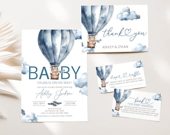 May include: Blue and white baby shower invitation featuring a watercolour illustration of a hot air balloon with a teddy bear pilot. The invitation reads "Baby Dylan is on his way!" and includes the date, time, and RSVP details.