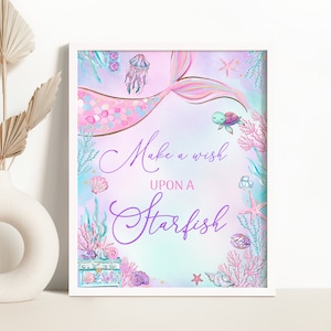 Las sirenas piden un deseo sobre un signo de estrella de mar Signo de fiesta de cumpleaños de sirena rosa bajo el signo de cumpleaños del mar 0198