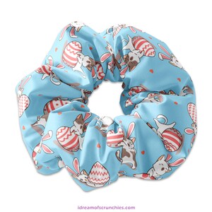 Lindos conejitos con huevos de Pascua, coleteros de Pascua con forma de gato y conejo, coleteros de gatitos con orejas de conejo, idea para canasta de Pascua