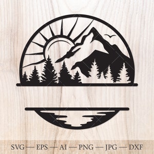May include: Black and white silhouette of a mountain range with a sun and trees in a circle. The bottom of the circle is cut out to allow for a name to be added. The bottom of the design is a lake with a reflection of the mountains.