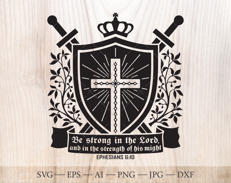Pu&ograve; includere: Grafica in bianco e nero di uno scudo con una croce al suo interno, due spade dietro lo scudo e una corona in cima. Uno stendardo sotto lo scudo recita "Siate forti nel Signore, e nella forza della sua potenza Efesini 6:10".