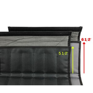 May include: Black padded fabric with a quilted pattern, measuring 5 1/2 inches wide and 6 1/2 inches long. The fabric has a black border and a gray interior. The image shows three layers of the fabric.