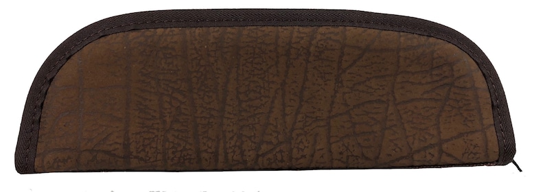 May include: A brown, semi-circular eyeglasses case with a textured surface. The case has a dark brown zipper and trim. The textured pattern resembles a tree bark design. The case is designed to protect eyeglasses.