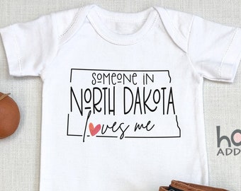 Someone In North Dakota Loves Me , Virtual Baby Shower Gift, Raglan Toddler Shirt, Baby Boy Gift, Long Distance Baby Gift, Fargo ND, Onesie®