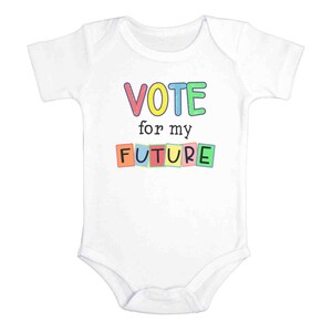 May include: White baby onesie with the text "VOTE for my FUTURE" in colorful letters.
