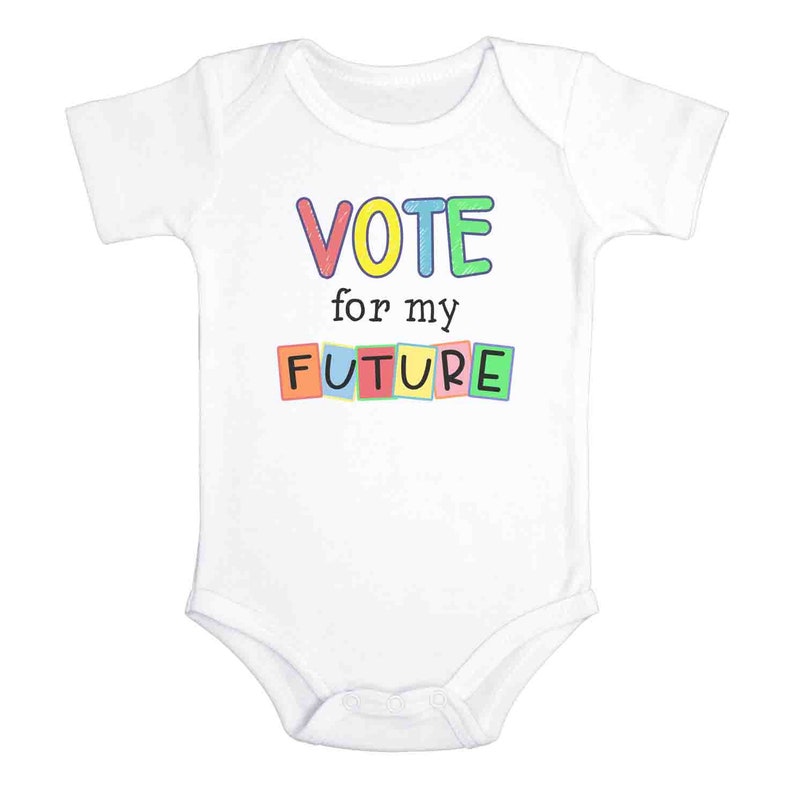 May include: White baby onesie with the text "VOTE for my FUTURE" in colorful letters.