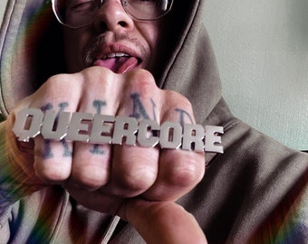 QUEERCORE knuckle ring. Stainless steel.