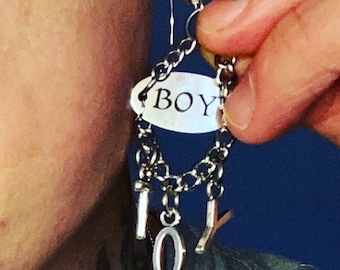 BOY TOY chandelier style stainless steel earring, now available in the store. Each one is handmade. Fits regular pierced ears.