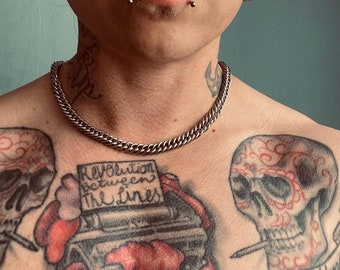 Chainmail style plain neck chain in stainless steel. Custom sized for your neck measurement. Fastens with small lobster clasp.