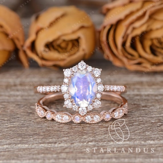 Floral halo oval engagement ring outlet