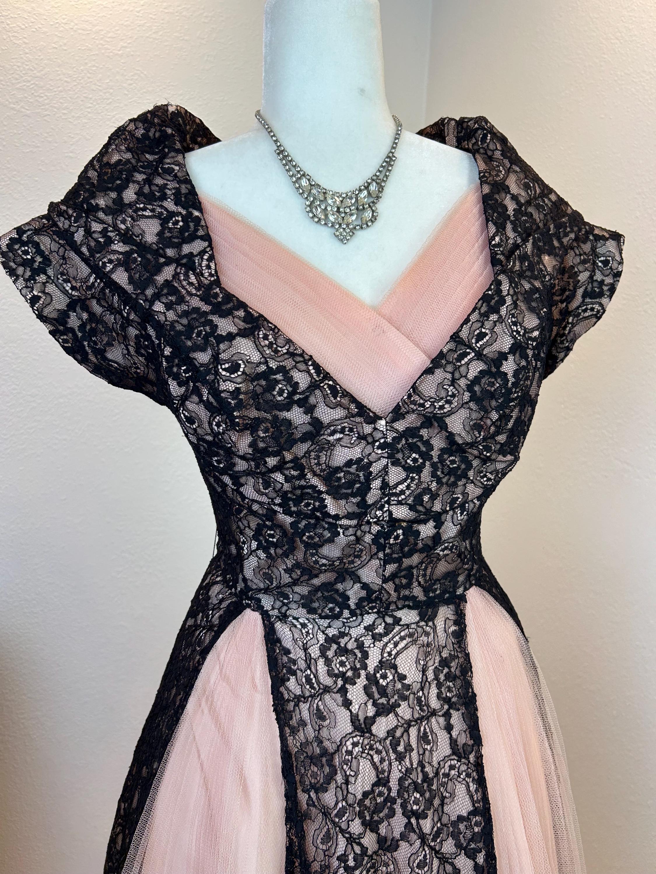 pink and black lace dress 1950s The dress is fully
