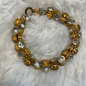 Vintage rollende armband met strass steentjes, jaren 1950/60