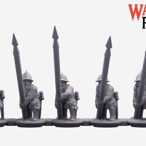 May include: Five gray miniature figurines of soldiers holding spears. Each figure is kneeling and wearing a helmet. The spears are tall and pointed. The War Printer logo is in the upper right corner.