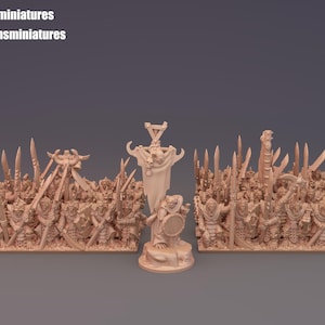 Peut inclure: Ensemble de figurines miniatures, comprenant une figurine centrale avec une bannière, flanquée de deux grandes structures à roues et de plusieurs rangées de soldats avec des épées. Les figurines sont de couleur marron clair.