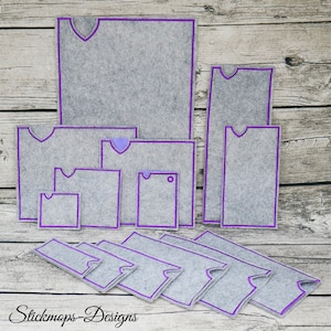 May include: An assortment of grey felt pouches and covers in different sizes, edged with purple stitching. The designs include rectangular and square shapes, some with a curved top edge. The text "Stickmops-Designs" is at the bottom.