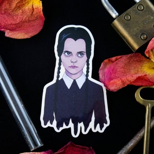 Wednesday Addams Sticker, Addams Family Sticker - Vinyl Sticker - Halloween Sticker - Spooky Sticker (3&quot; x 1.8&quot;)