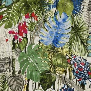 May include: A colorful tropical print fabric featuring large green, blue, and yellow leaves with red and pink flowers.