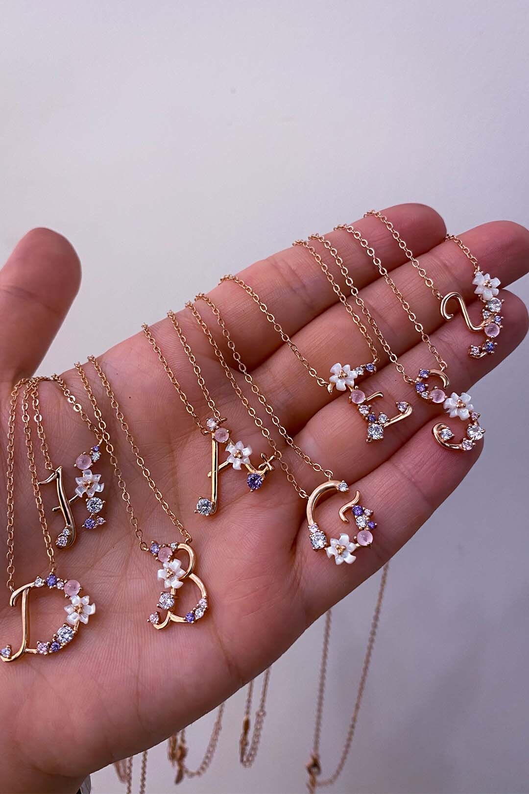 Floral letter hotsell necklace