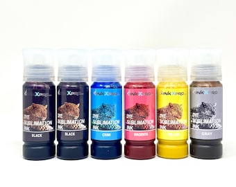 May include: Six bottles of dye sublimation ink in black, cyan, magenta, yellow, and gray. Each bottle has a clear cap and a label with a leopard print and the text "Dye Sublimation Ink".
