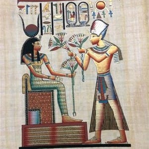 May include: An Egyptian papyrus painting depicts a seated figure receiving flowers from a standing figure. The figures are adorned in colorful garments and headdresses. Hieroglyphs and decorative elements are present at the top. The artwork is on a beige background.