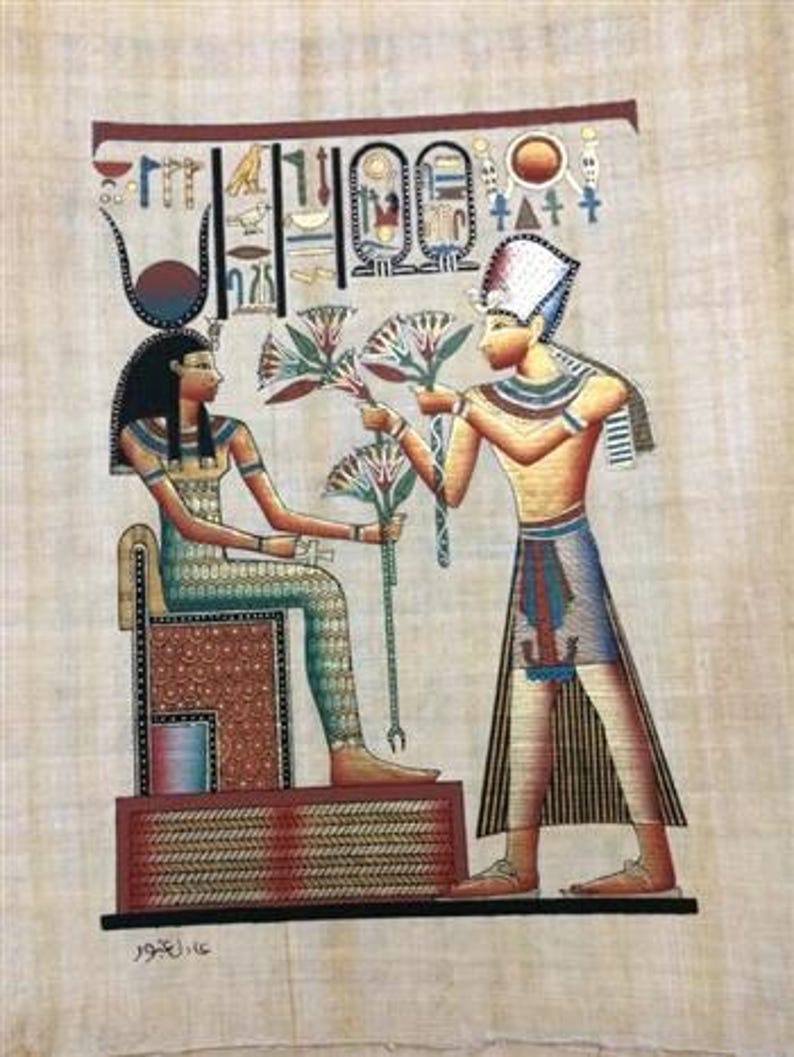 May include: An Egyptian papyrus painting depicts a seated figure receiving flowers from a standing figure. The figures are adorned in colorful garments and headdresses. Hieroglyphs and decorative elements are present at the top. The artwork is on a beige background.