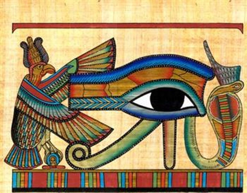 May include: A colorful Egyptian papyrus painting featuring the Eye of Horus, a symbol of protection and royal power. The eye is detailed with blue, green, and gold, with a black pupil. A falcon-headed figure is on the left, and the background is a tan color.