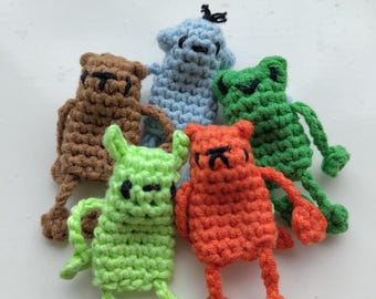 Tuggle crochet fidget toy for anxiety or stress relief. Marble pusher with Pully arms and legs. Different designs available