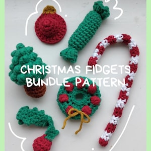 May include: A collection of handmade crochet Christmas-themed fidget toys. The set includes a red ornament, a green candy, a candy cane, a Christmas tree, a wreath, and a green and red ornament. The text "CHRISTMAS FIDGETS BUNDLE PATTERN" is also visible.