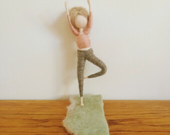 Wool felted yogi doll with yoga mat. Handmade felt yogini doll.