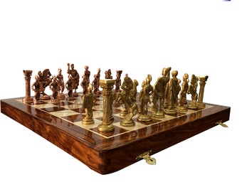 Folding Brass Roman chess figures & rosewood chess board set with storage of chess men.