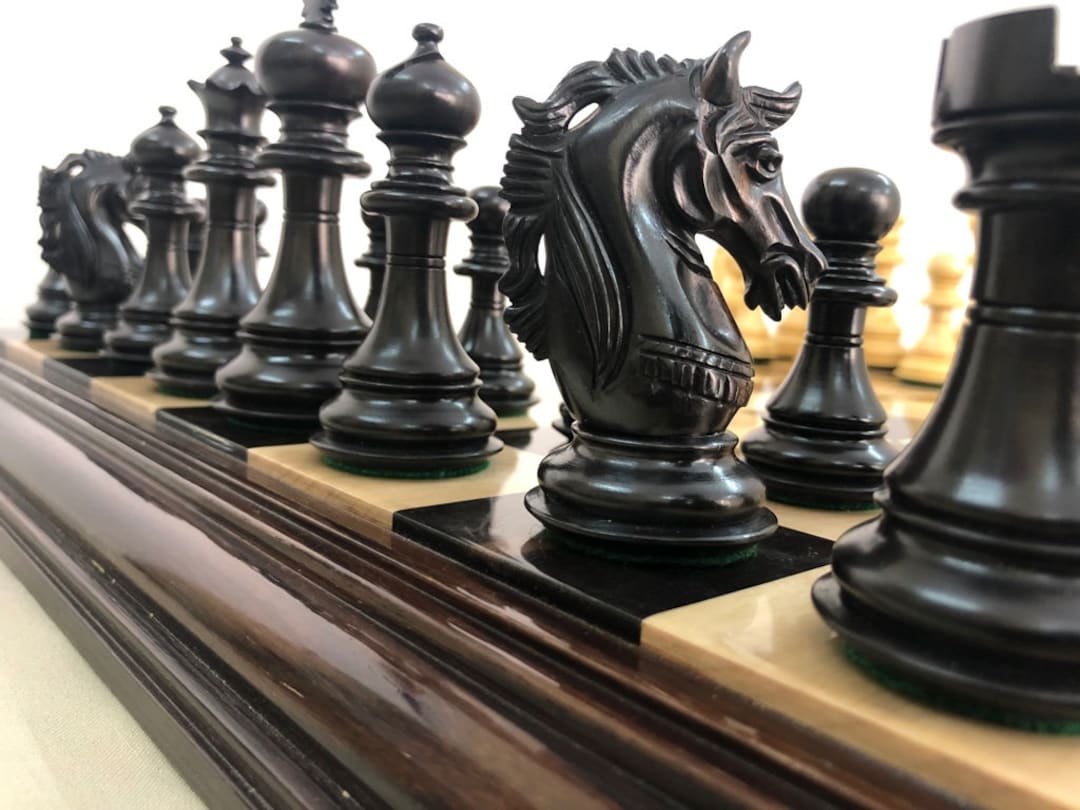 The Queen's Gambit Final Game Chess Set Ebonized & Boxwood Pieces with Queen's  Gambit Board - 4 King - The Chess Store