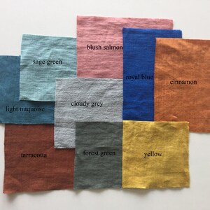 May include: A collection of fabric swatches in various colors, including sage green, blush salmon, royal blue, cinnamon, cloudy grey, light turquoise, terracotta, forest green, and yellow.