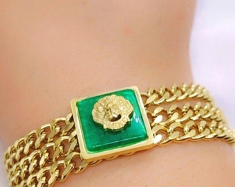 Three-chain bracelet in gold gourmet mesh in gold stainless steel